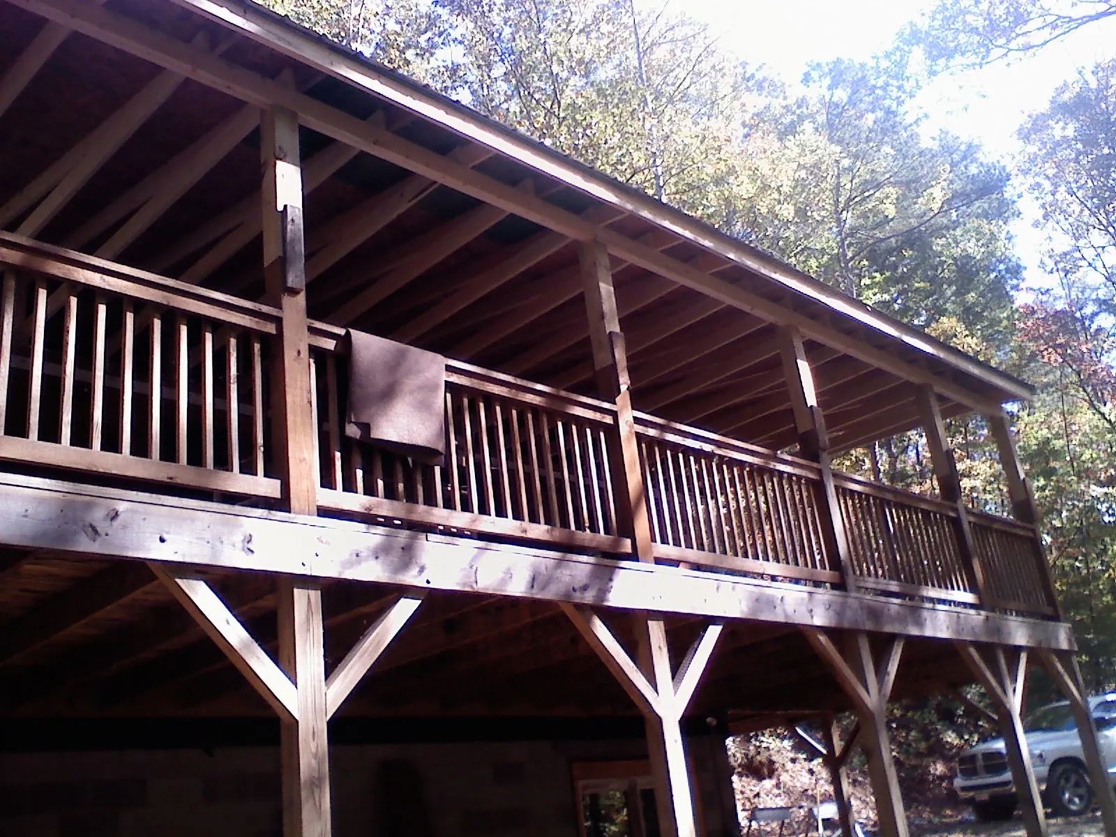 Timber framing under a new elevated porch and deck — Roof Leak Repair in Nevis by Roofing Brothers